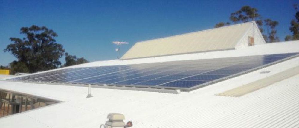 Solar array on the white roof of Wanneroo Aquamotion